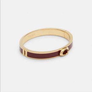 Coach Signature Push Hinged Bangle, Burgundy color.